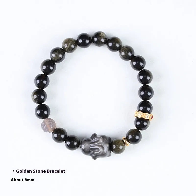 Handmade grey agate and silver lying rabbit charm bracelet on wrist, showing 10mm bead size option.