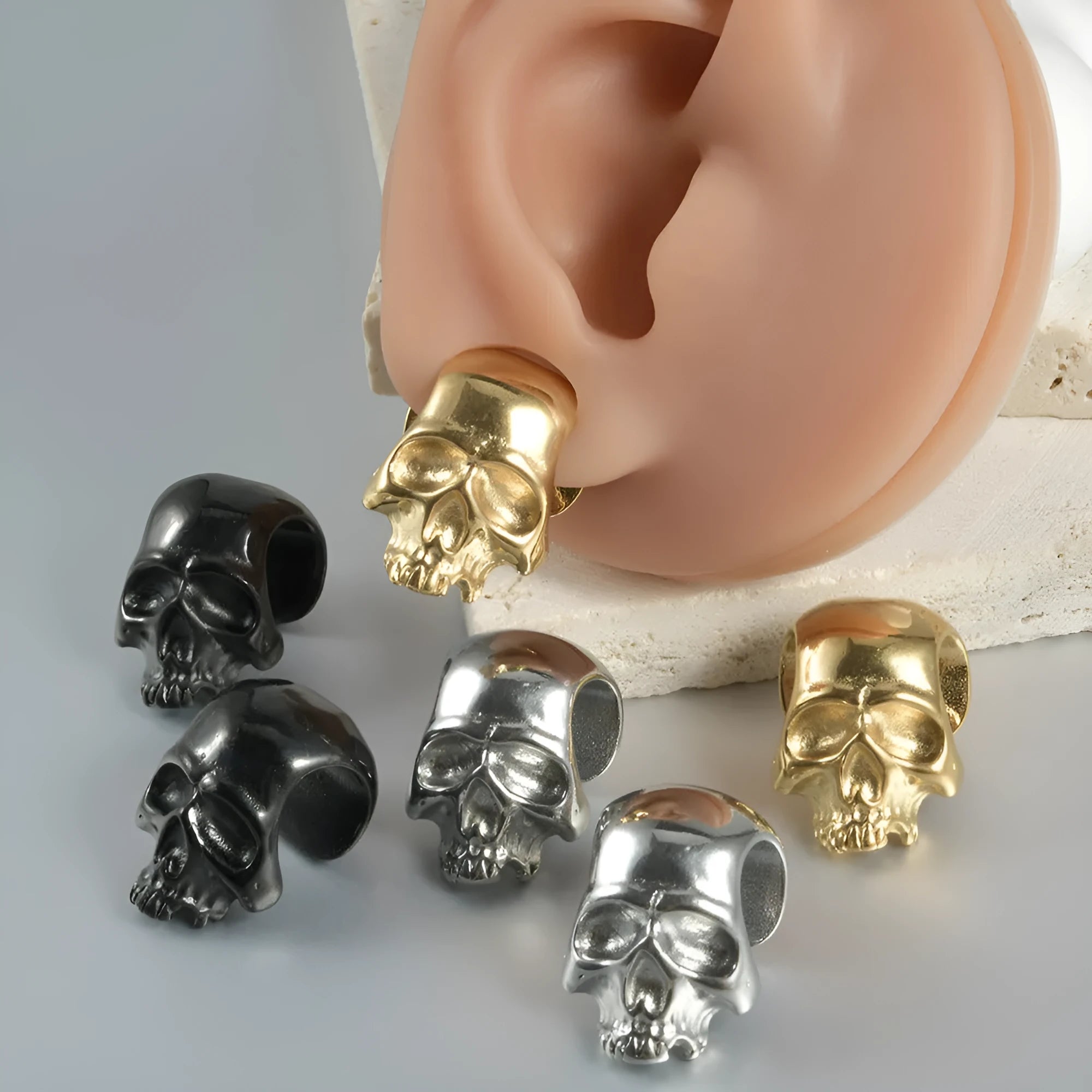 Stainless steel hollow skull Buddha earring in gold, black or steel colour for unisex hip hop fashion