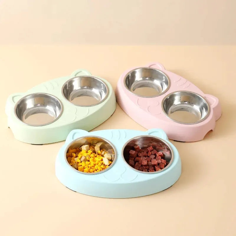 Blue, green, and pink macaron-shaped plastic double bowl pet feeding tray for cats and dogs.