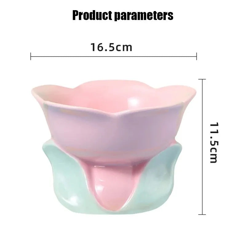 Blue ceramic elevated pet bowl with floral pattern and non-slip base for cats and small dogs.