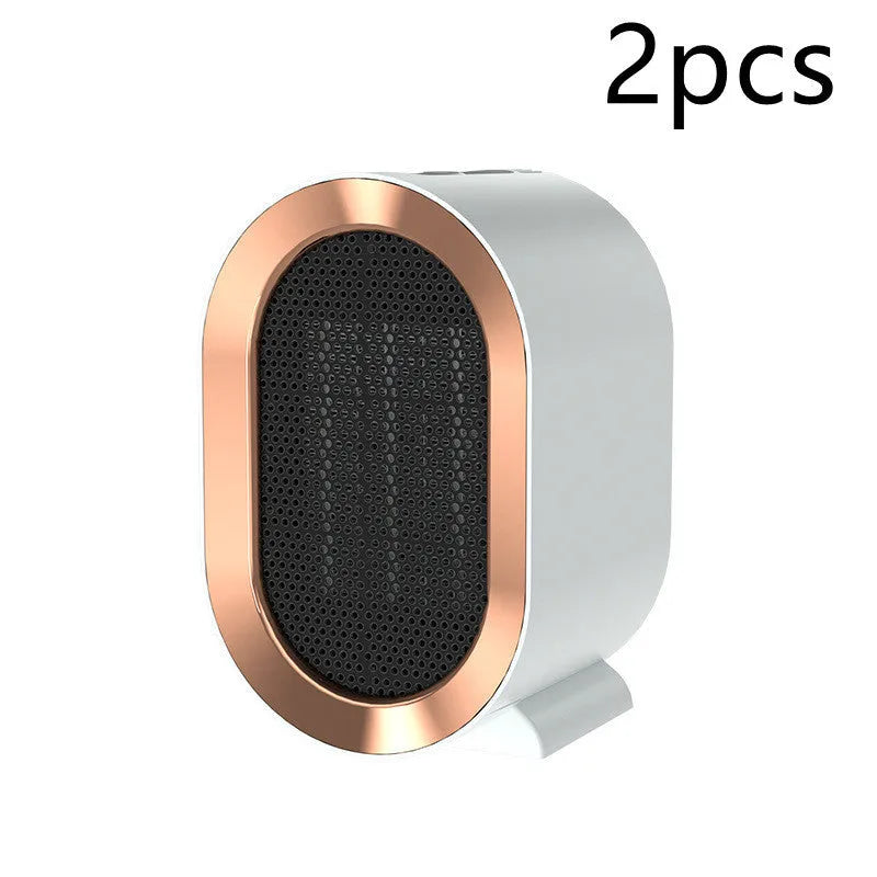 Desktop electric ceramic heater in various colours with mechanical controls and compact portable design