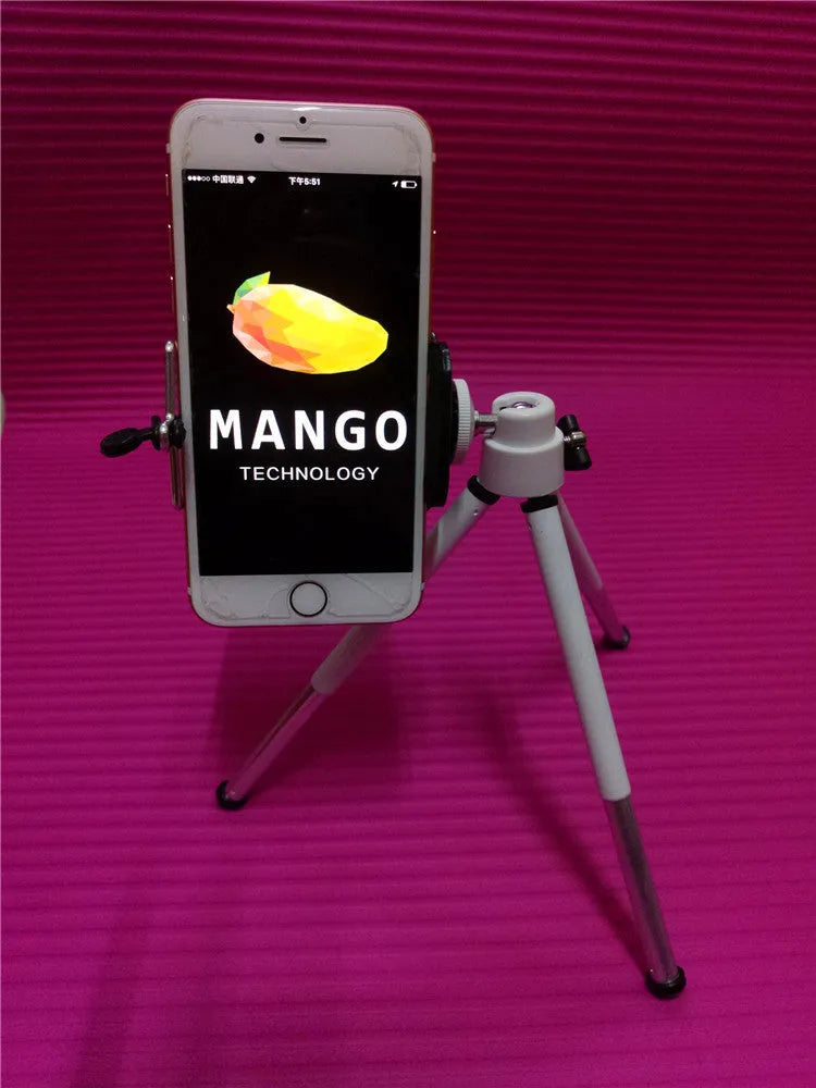 Black desktop phone holder with a two-section adjustable bracket arm holding a mobile phone.