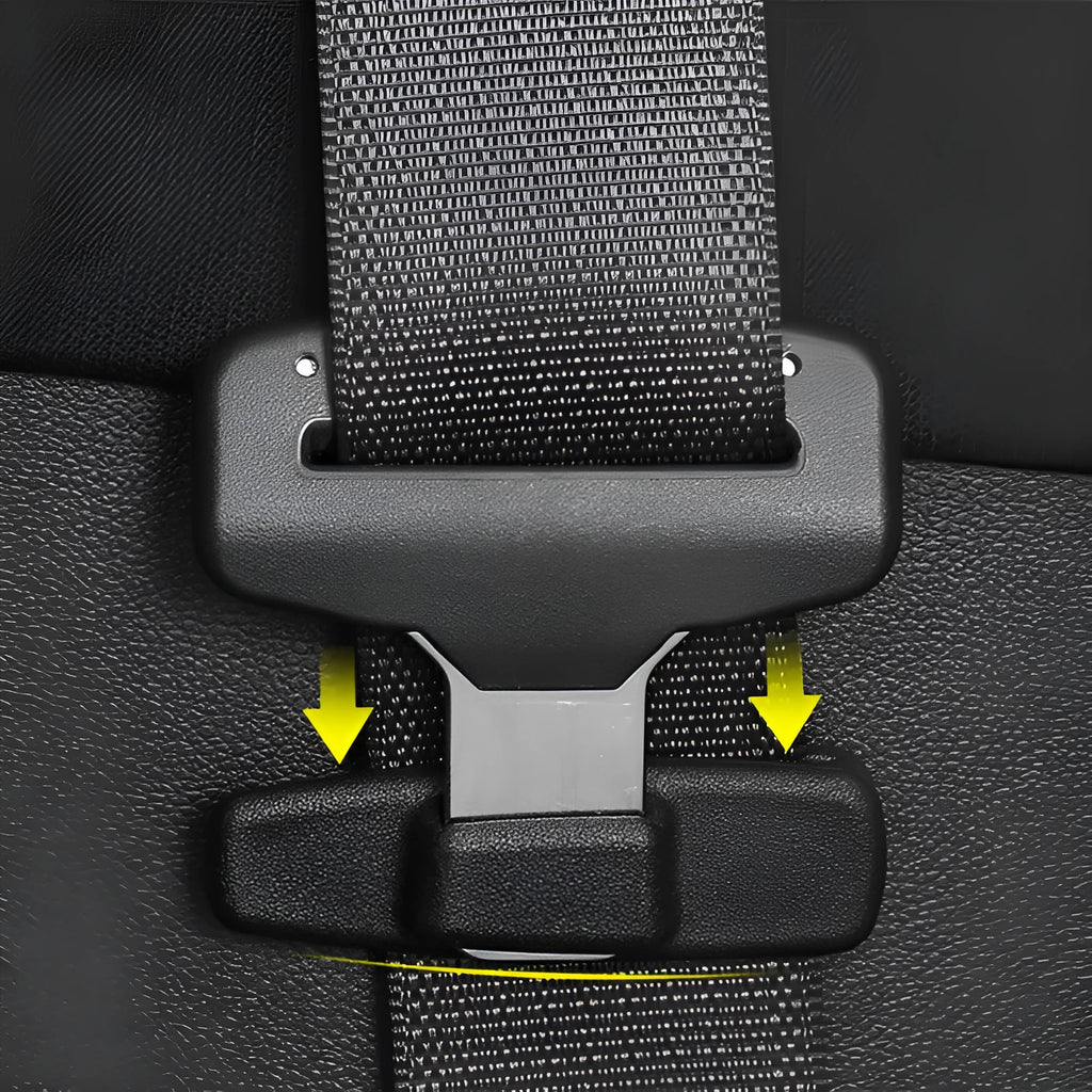 Two black plastic car safety belt clips for adjustable seat belt tension.
