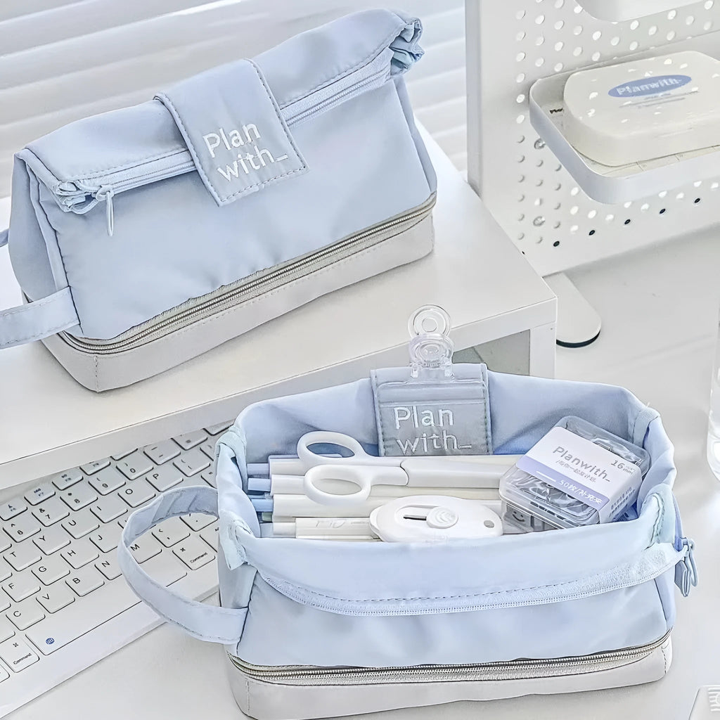 Folding double layer polyester pencil case in dark blue, blue, or cream white with compartment design for stationery organisation.