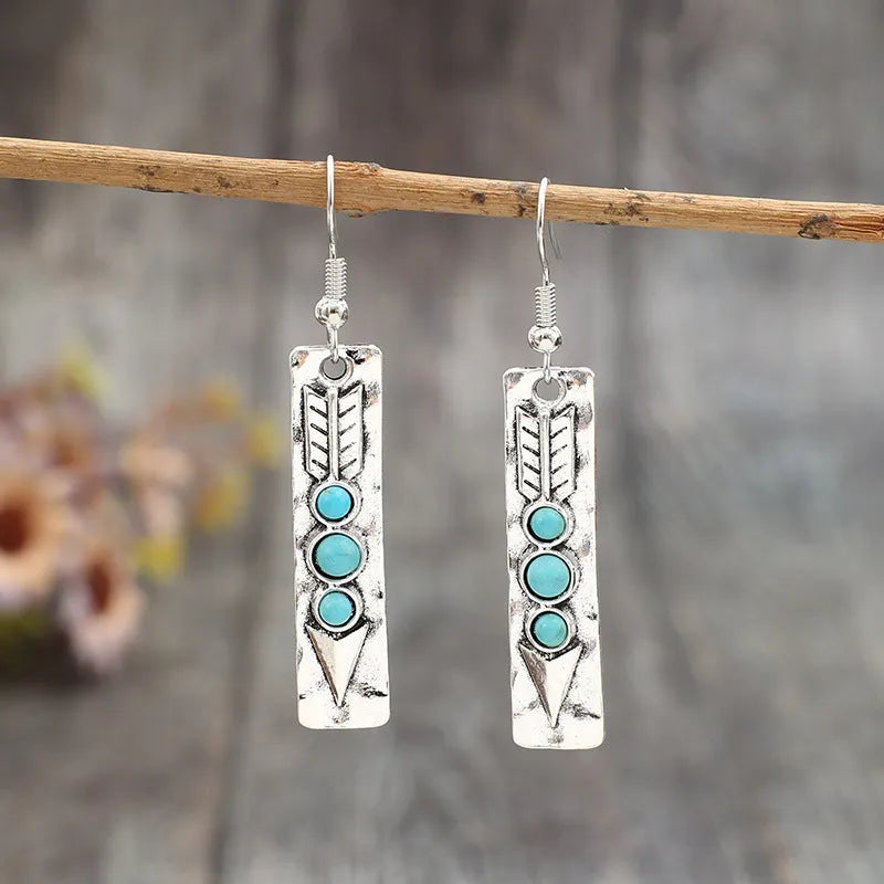 Silver geometric retro earrings with turquoise inlay, long strip drop design