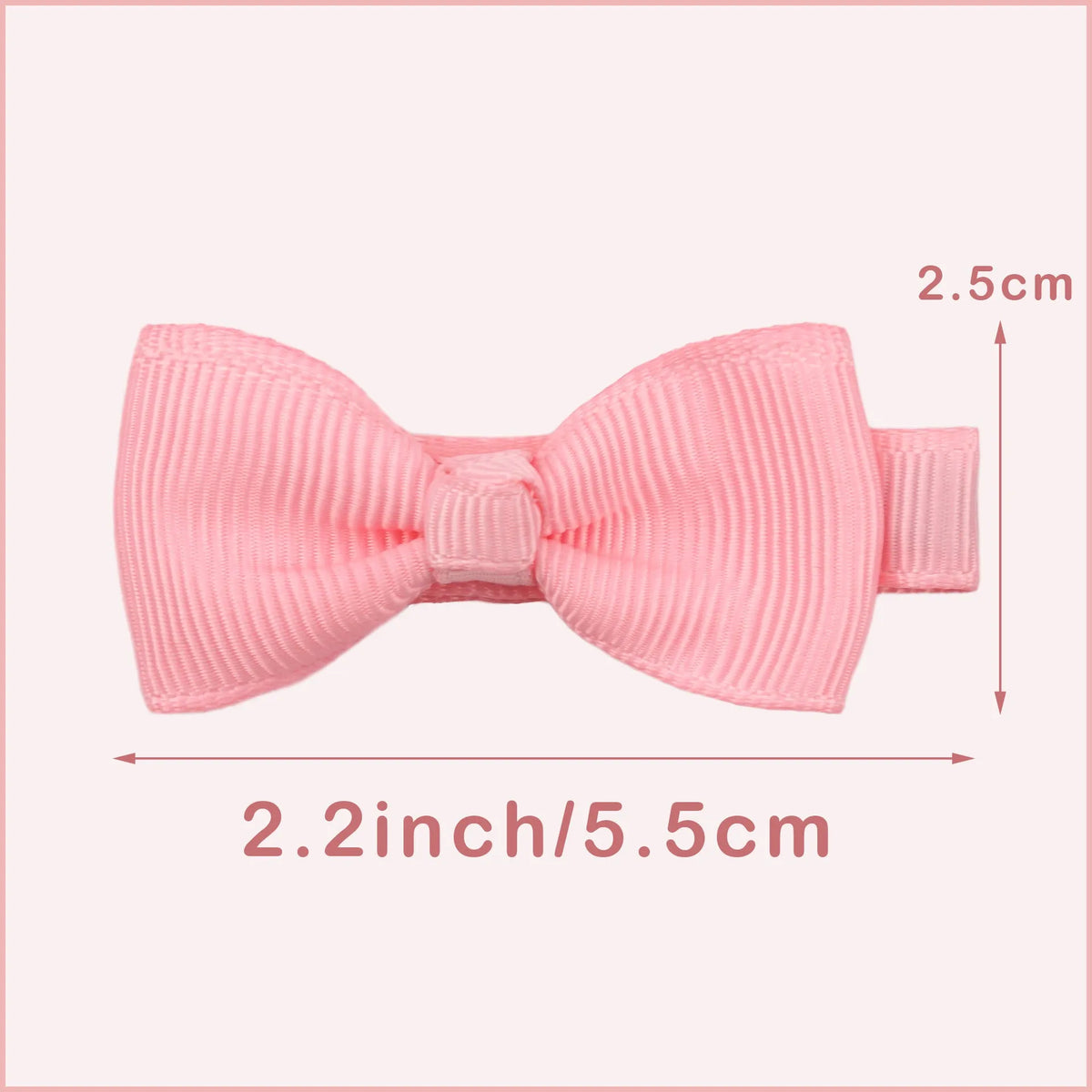 Set of pastel-coloured baby hair clips and bows arranged in rows, showing variety of colours.