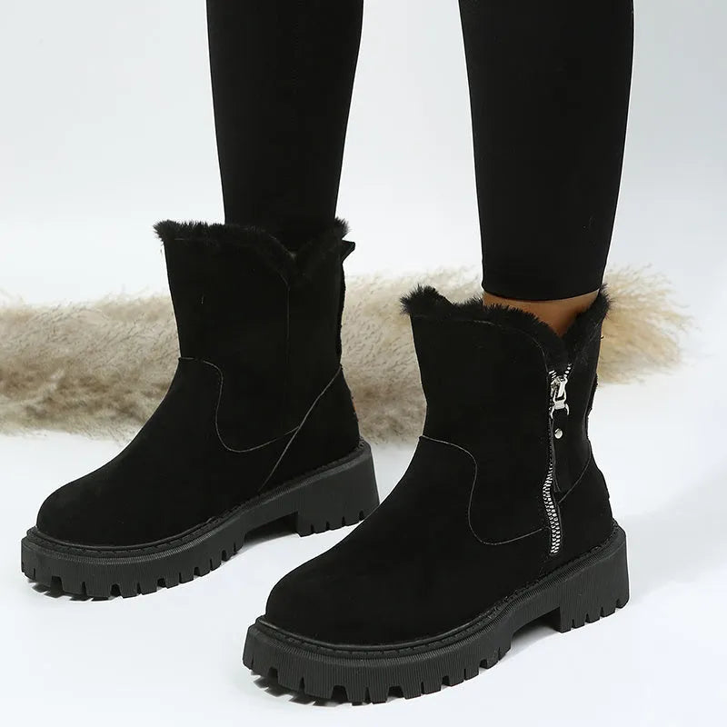 Women's black thick plush high-top snow boots with a side zipper and non-slip sole.