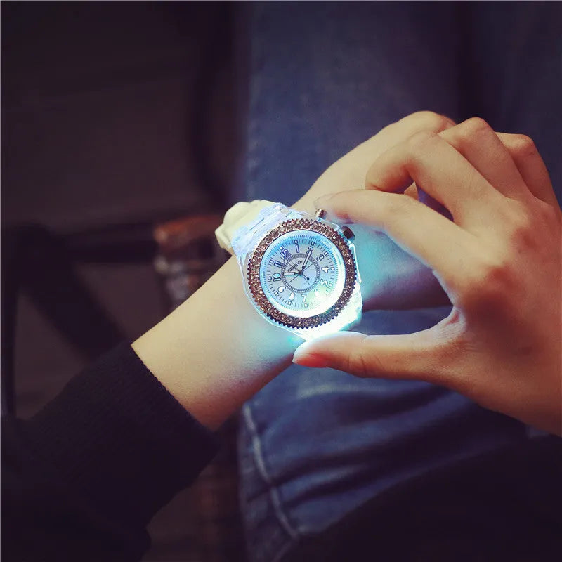 Women's LED luminous watch with colourful dial on silicone strap showing 43mm size