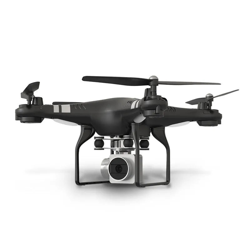 Black HD aerial photography drone with remote control handle on a table