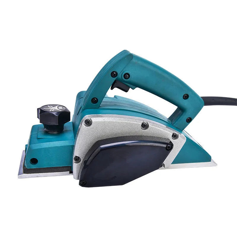 Red aluminium electric wood planer tool with 82mm cutting width on workbench