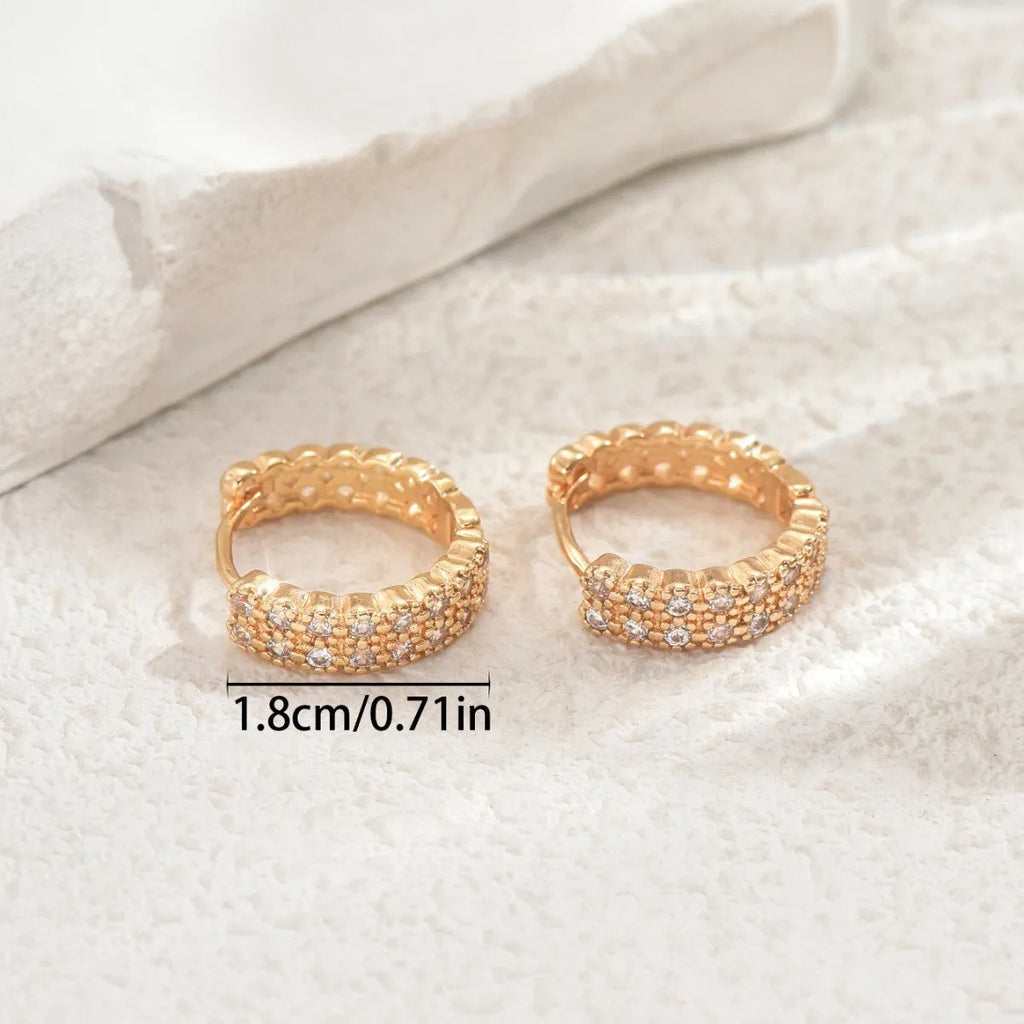 Geometric pattern copper ear studs with round, dot and ring elements in colour DE20288
