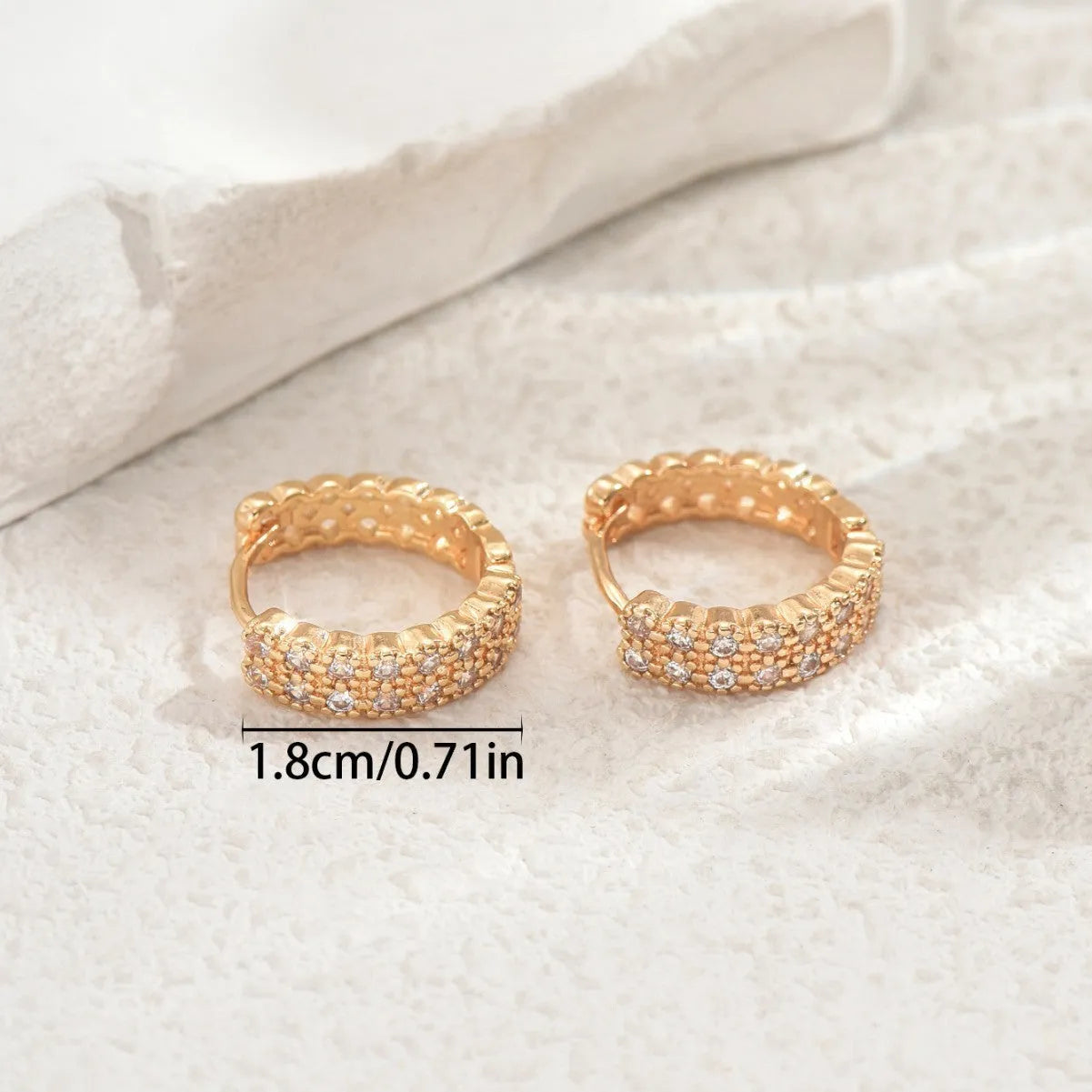 Geometric pattern copper ear studs with round, dot and ring elements in colour DE20288