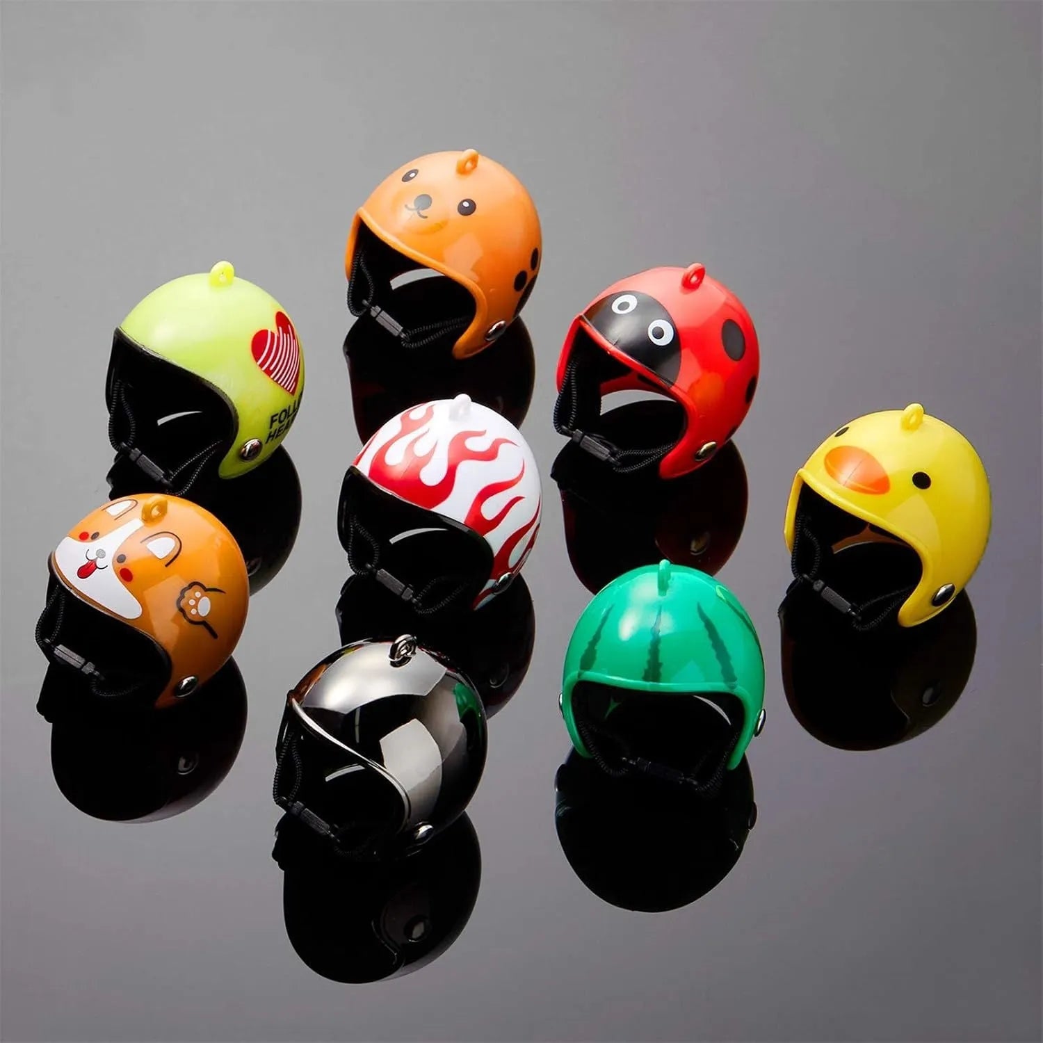 Small colourful plastic helmet with elastic straps, designed for a chicken or small bird to wear.
