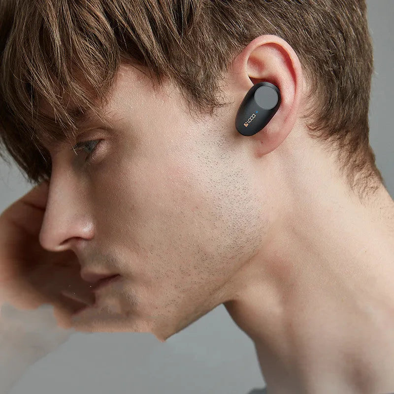 Black wireless bluetooth headset with charging stand featuring ANC and type-C wireless charging capabilities
