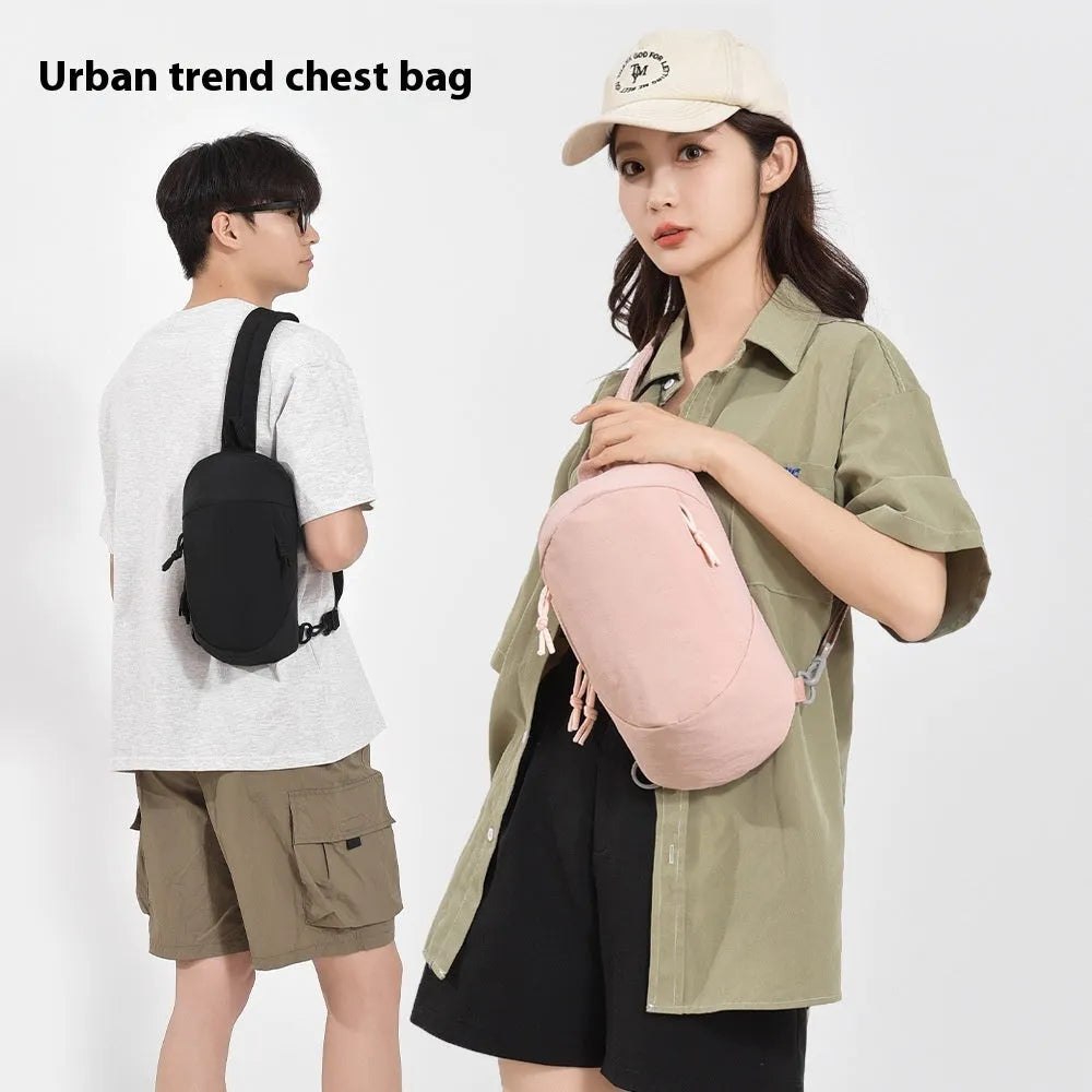 Girls' nylon crossbody bag in army green with a single shoulder strap and phone pocket.
