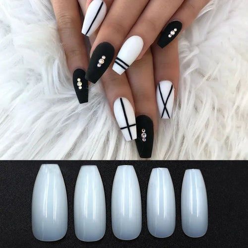 500 clear and natural coloured ABS plastic false nails in ten different sizes arranged on a white surface