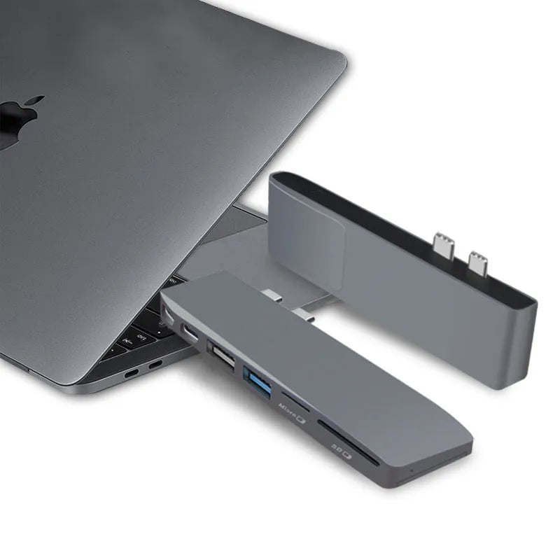 Space grey 8-in-1 USB-C hub for MacBook Pro with dual card readers and HDMI port