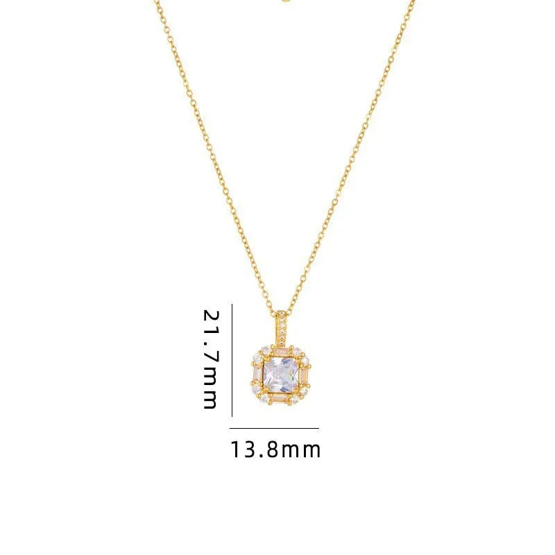 Gold geometric zircon inlaid pendant on a water wave chain necklace.
