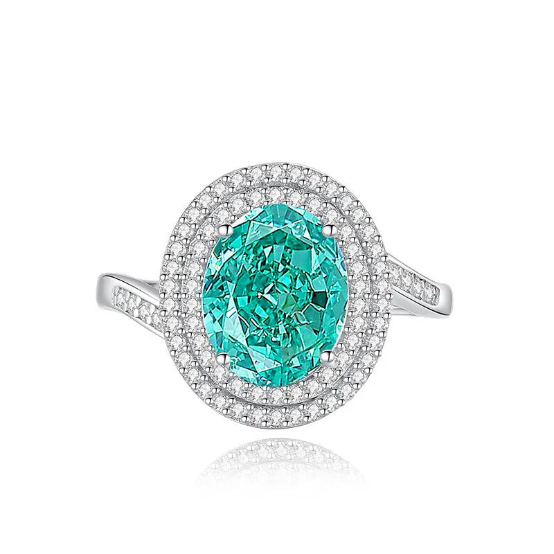 Geometric S925 sterling silver women's ring with an emerald stone and high carbon diamond inlay.