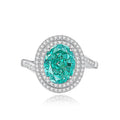 Geometric S925 sterling silver women's ring with an emerald stone and high carbon diamond inlay.