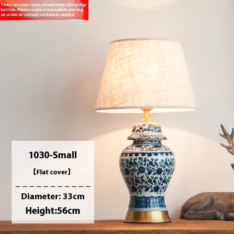 Chinese blue and white porcelain table lamp with ceramic base on bedside table