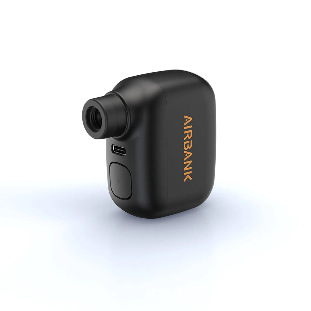 Black AS100 electric bicycle pump with USB charging port showing compact dimensions
