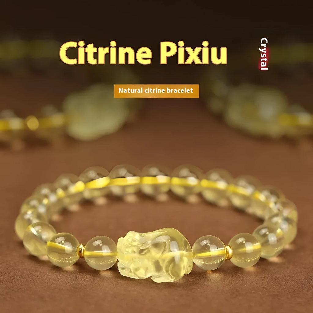 Yellow leather bracelet with an artificial citrine Pi Xiu charm in simple Chinese style.