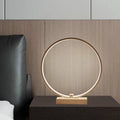 25cm round white LED bedside lamp with acrylic frame and iron base, shown in warm white or cool white