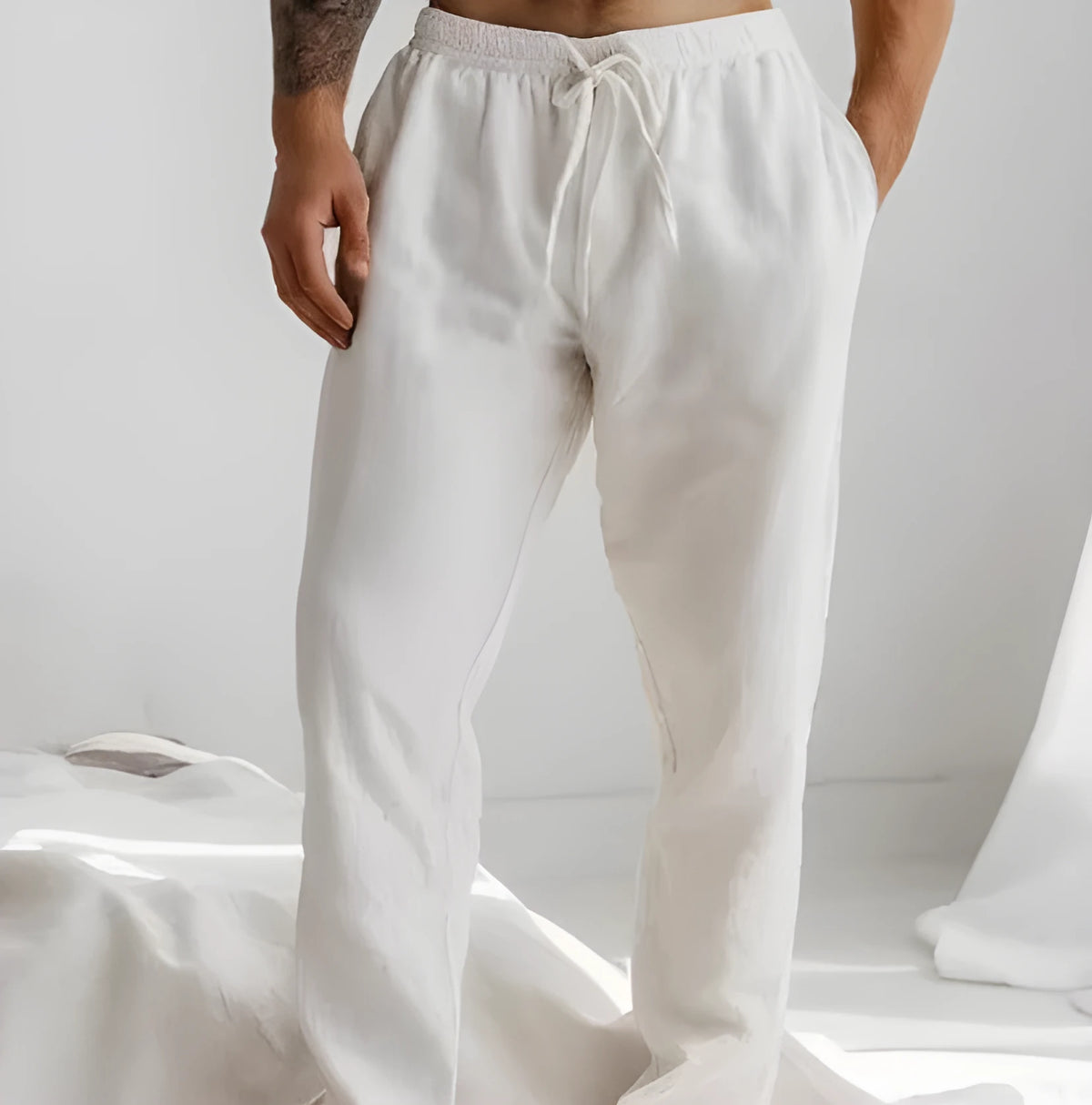 Men's loose fit summer trousers in light blue with elastic waistband and straight leg opening