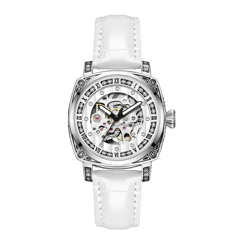 Leather strap mechanical wristwatch with luminous hands on a black dial.