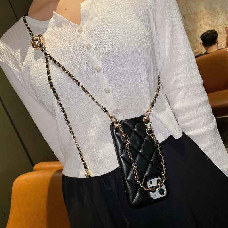 Xiaoxiangfeng imitation leather iPhone case with adjustable cross-body strap and small golden ball detail.