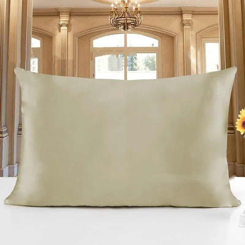 19 M double-sided silk pillowcase shown in apricot colour, lying flat to show envelope closure.