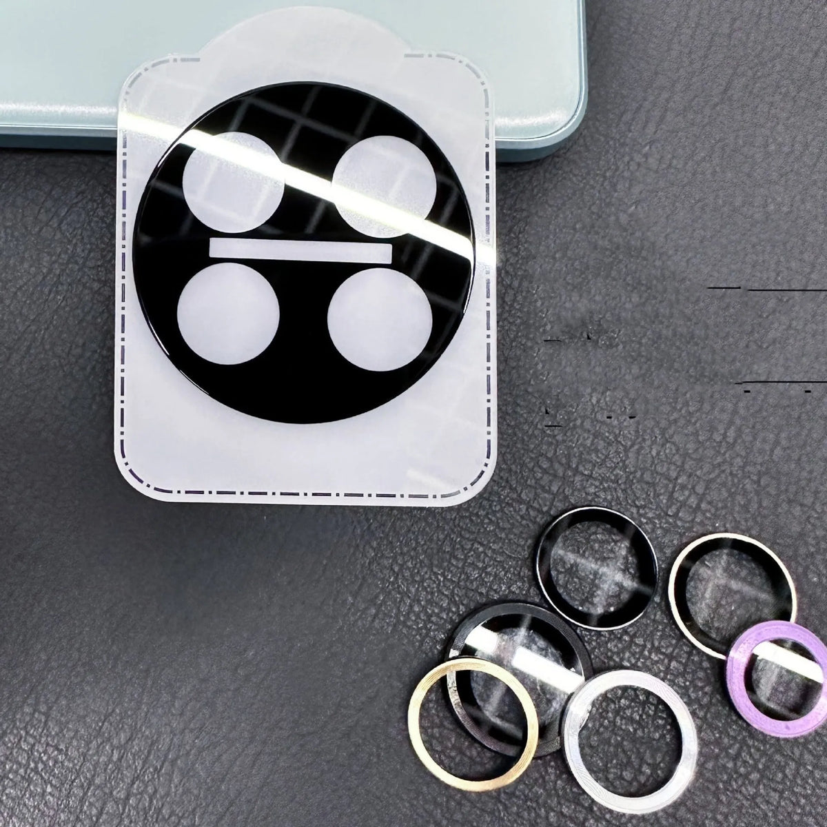 Large Arc HD Tempered Glass Lens Protector with black ring for OnePlus 12, Find N3, and OnePlus 11 phones.