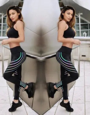 Women's black fitness leggings with reflective print pattern for night workouts