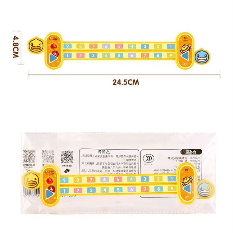 Yellow plastic cartoon digital resolution ruler for children, 24.5cm long.