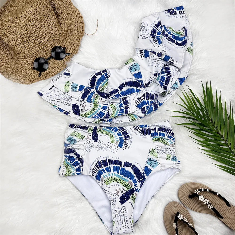 White women's one-shoulder swimsuit with lotus leaf skirt detail and double-layer construction