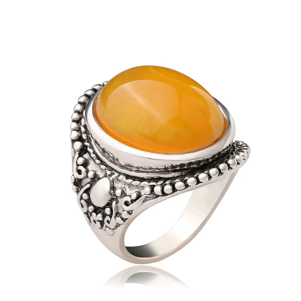 Geometric fluorescent beeswax design alloy ring in antique silver amber finish.