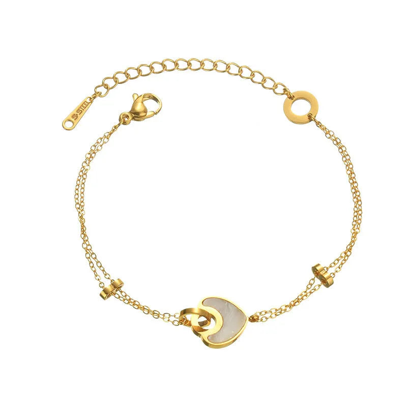 Women's stainless steel bracelet with a double-layer resin heart pendant.