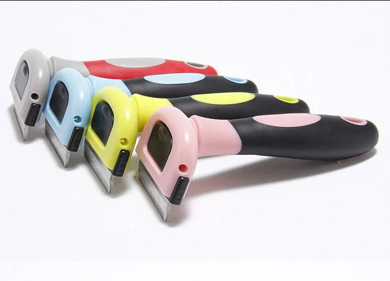 Removable ABS dog hair removal comb in blue or pink, available in small, medium and large.