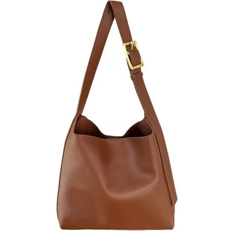 Soft PU leather ladies shoulder bag with swing threads in black or brown