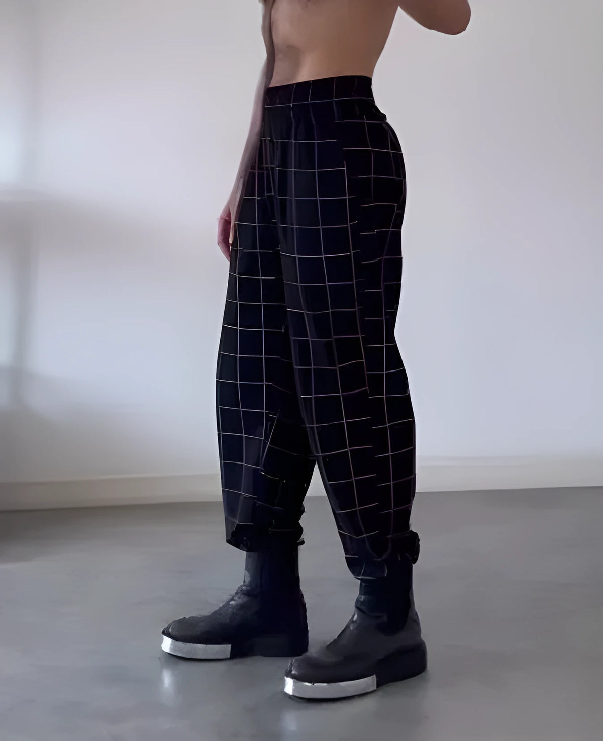 Men's plaid trousers with apron-style front panel in casual style