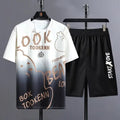 Men's light blue ice silk short sleeve T-shirt and matching shorts summer suit set laid flat.