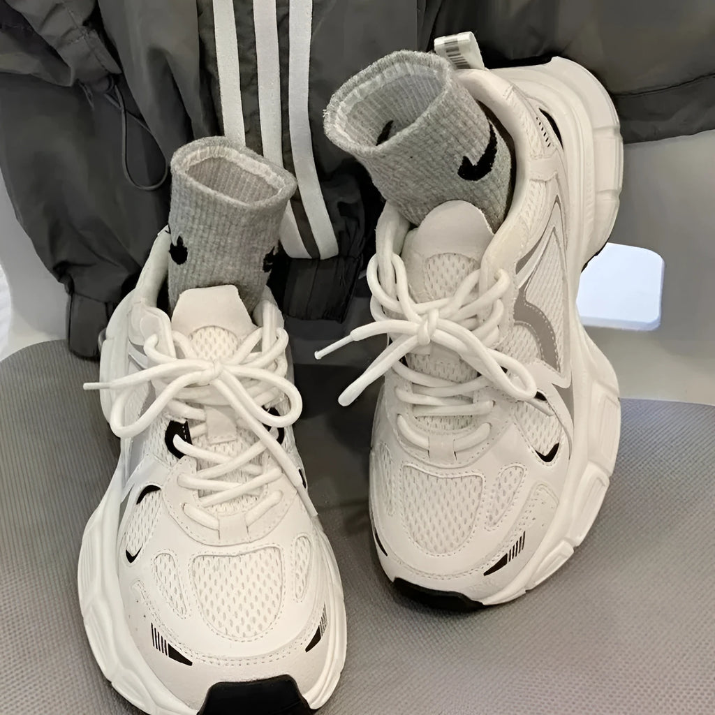 Beige Polar Wave mesh platform sports shoes with a wedge heel and lace-up front.