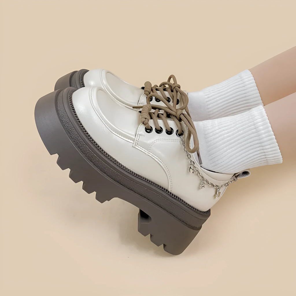 White platform Mary Jane shoes with round toe, lace-up front, and chunky 6-8cm heels