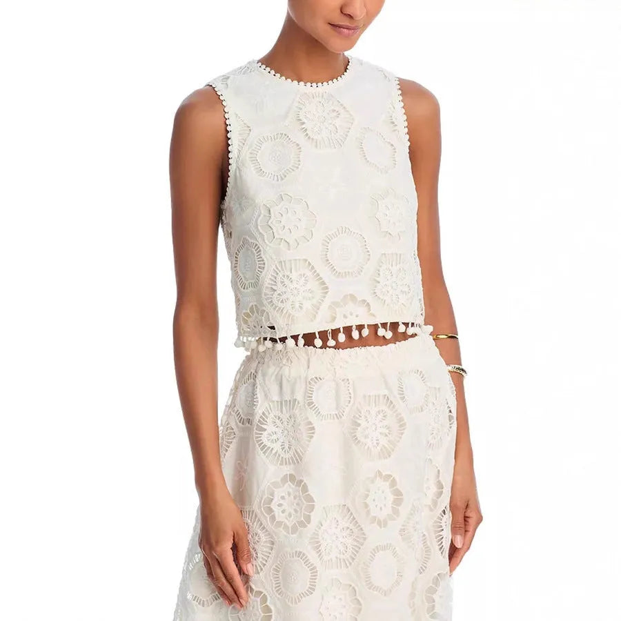 White women's sleeveless top and long skirt suit set with retro embroidery on polyester fabric