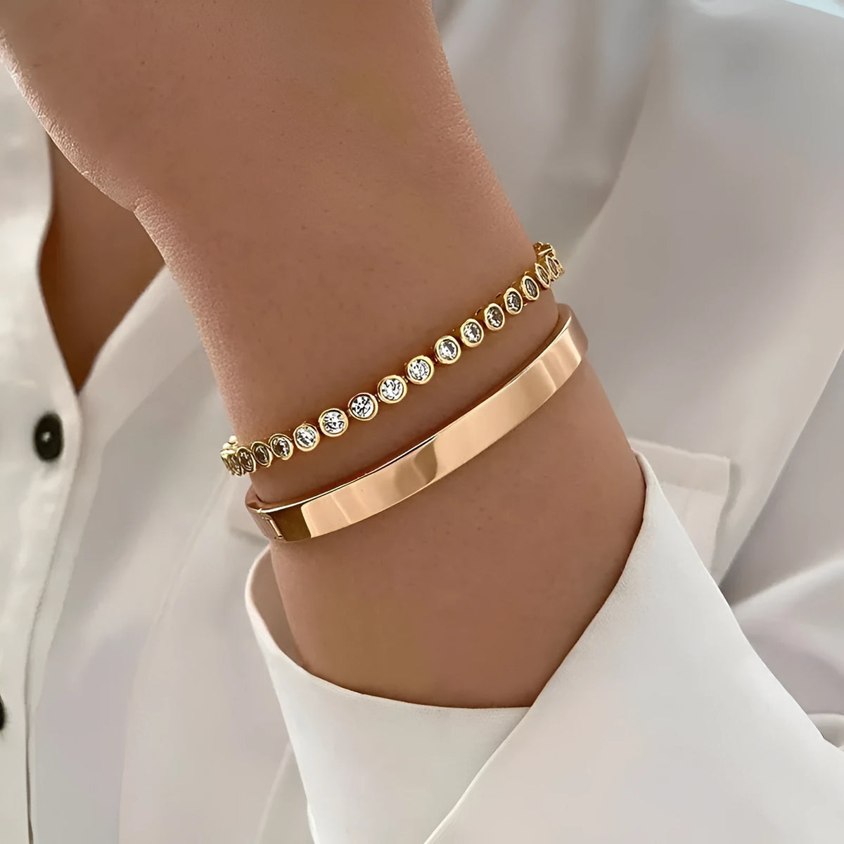 Gold and silver electroplated zinc alloy charm bracelet set with drop, geometric and water droplet details