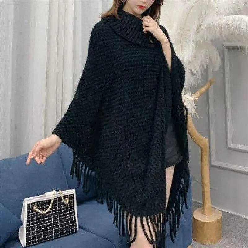 Women's plush triangle shawl cape in a cashmere acrylic blend with tassel detailing