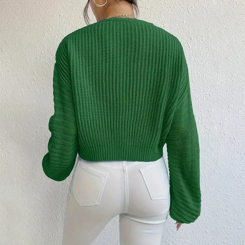 Women's solid color long sleeve pullover top in loose casual fit made of polyester