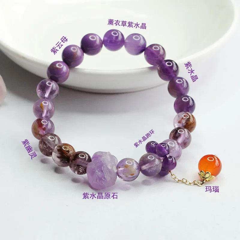 Natural nine purple amethyst and red agate multi-treasure crystal bracelet on wrist.
