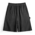 Cement grey American-style heavy loose profile straight cut sports shorts with elastic waistband